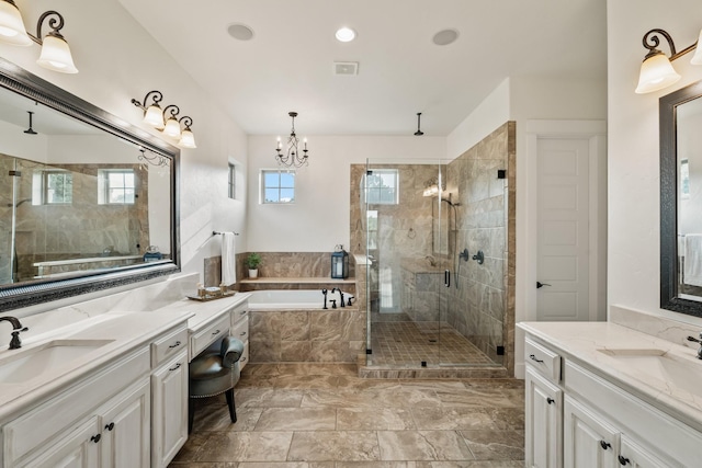 215 Thornhill Cir, Double Oak, TX 75077 - full bathroom with a stall shower, two vanities, a bath, a chandelier, and recessed lighting