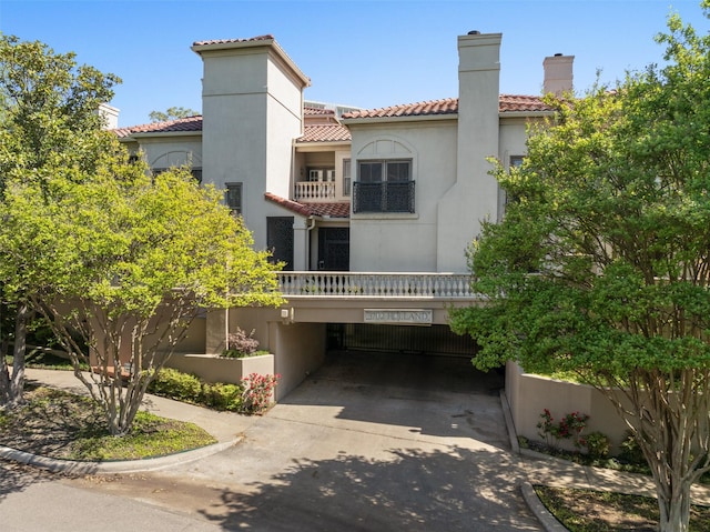 3702 Holland Ave Unit 1, Dallas, TX 75219 - view of property with a carport