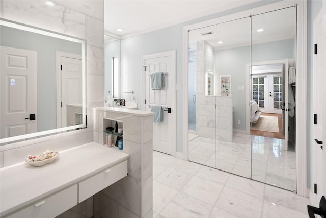 3702 Holland Ave Unit 1, Dallas, TX 75219 - bathroom featuring marble look tile flooring, a stall shower, french doors, recessed lighting, and baseboards