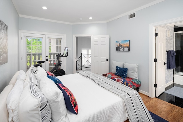 3702 Holland Ave Unit 1, Dallas, TX 75219 - bedroom with wood finished floors, crown molding, access to exterior, recessed lighting, and baseboards