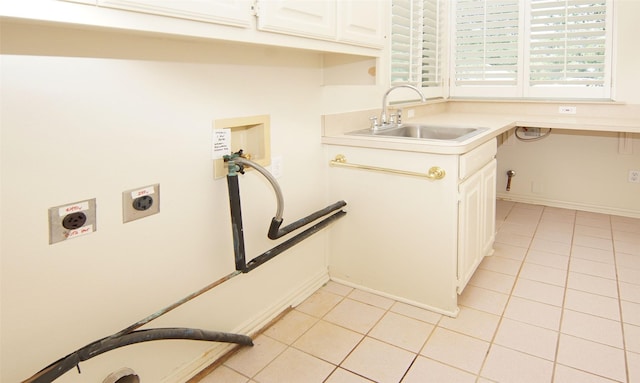 332 Diamond Oaks Dr, Hudson Oaks, TX 76087 - laundry room with light tile patterned floors, cabinet space, washer hookup, and electric dryer hookup