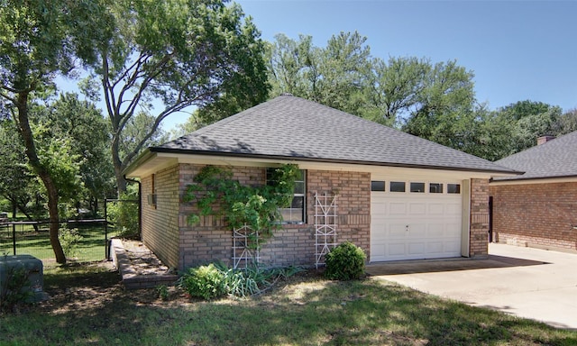 332 Diamond Oaks Dr, Hudson Oaks, TX 76087 - view of side of property featuring concrete driveway, a garage, brick siding, and a shingled roof