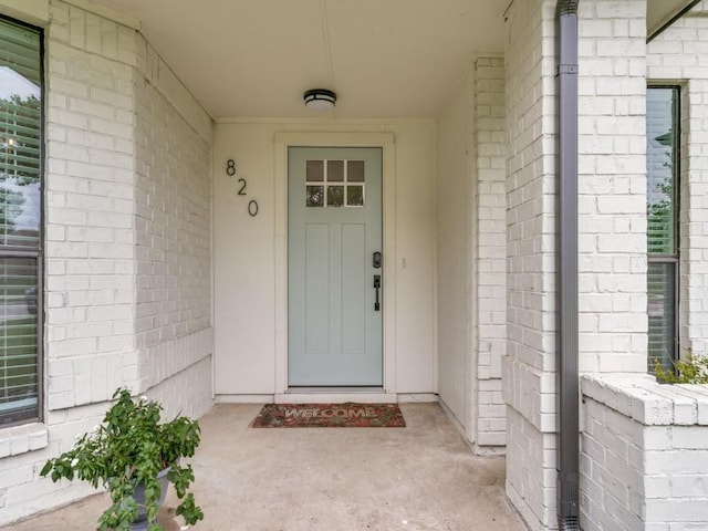 820 Arbor Downs Dr, Plano, TX 75023 - doorway to property featuring brick siding