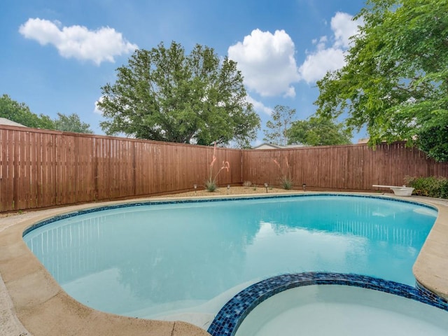 820 Arbor Downs Dr, Plano, TX 75023 - view of pool featuring a fenced backyard and a pool with connected hot tub