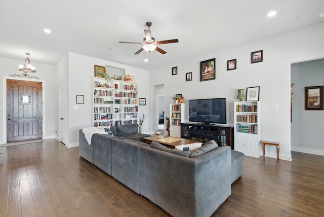 3385 Dps Tower Rd, Perrin, TX 76486 - living area with a ceiling fan, dark wood-style flooring, recessed lighting, and a chandelier