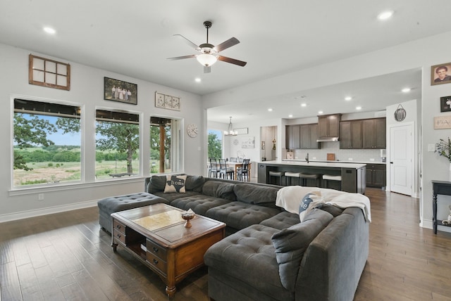 3385 Dps Tower Rd, Perrin, TX 76486 - living area featuring ceiling fan, dark wood-type flooring, recessed lighting, and a chandelier