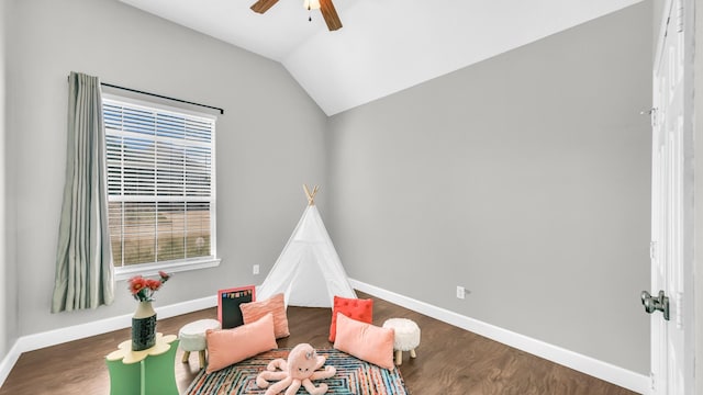5709 Courtney Cir, Haltom City, TX 76137 - rec room with ceiling fan, baseboards, vaulted ceiling, and wood finished floors