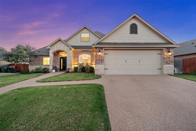 386 Cavitt Ct, Robinson, TX 76706 - view of front facade with brick siding, driveway, a shingled roof, and an attached garage
