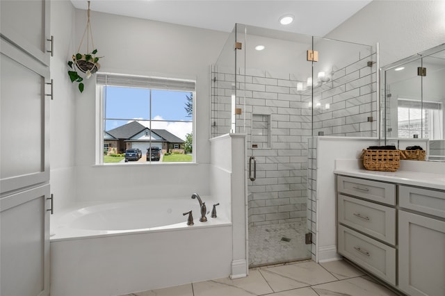 386 Cavitt Ct, Robinson, TX 76706 - bathroom with a garden tub, vanity, a stall shower, a chandelier, and recessed lighting