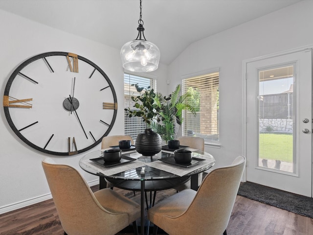 4148 Agatha Ln, Celina, TX 76227 - dining room with dark wood-style flooring, lofted ceiling, and baseboards