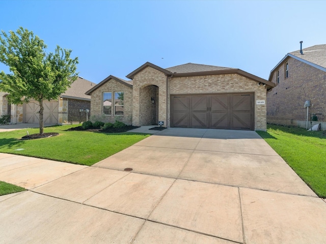 4148 Agatha Ln, Celina, TX 76227 - view of front facade with brick siding, concrete driveway, an attached garage, and a front lawn