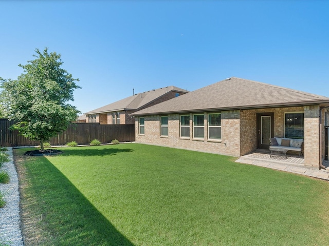 4148 Agatha Ln, Celina, TX 76227 - rear view of house with a shingled roof and brick siding