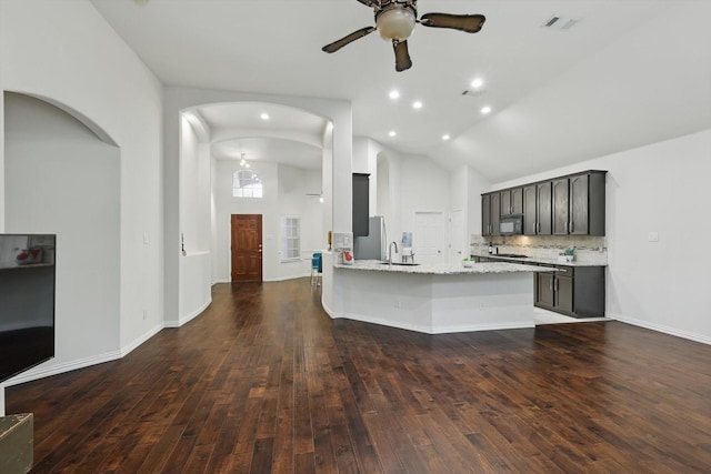 736 Kilbridge Ln, Coppell, TX 75019 - kitchen with black microwave, a sink, ceiling fan, hardwood / wood-style floors, and vaulted ceiling