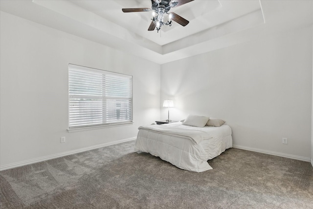 736 Kilbridge Ln, Coppell, TX 75019 - bedroom featuring carpet floors, a tray ceiling, baseboards, and ceiling fan