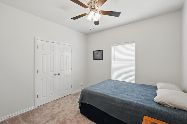 736 Kilbridge Ln, Coppell, TX 75019 - bedroom with light carpet, ceiling fan, baseboards, and a closet