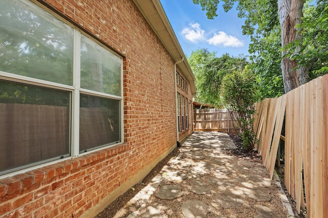 736 Kilbridge Ln, Coppell, TX 75019 - view of property exterior featuring brick siding, a fenced backyard, and a patio area
