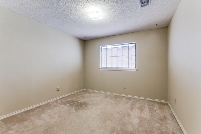 1719 Timberway Dr, Richardson, TX 75082 - unfurnished room featuring carpet floors, baseboards, and a textured ceiling