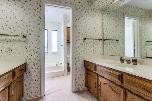 1719 Timberway Dr, Richardson, TX 75082 - full bath featuring vanity, wallpapered walls, a tub to relax in, and toilet