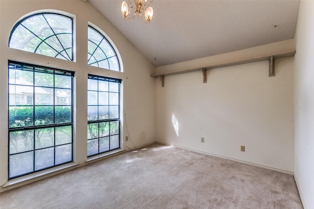 1719 Timberway Dr, Richardson, TX 75082 - spare room with carpet floors, a chandelier, high vaulted ceiling, and baseboards