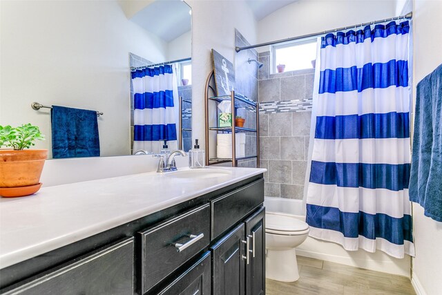4012 Gennaker Dr, Denton, TX 76210 - full bathroom featuring vanity, shower / bath combo, and wood finished floors