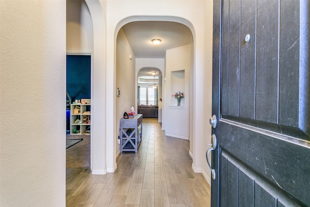 4012 Gennaker Dr, Denton, TX 76210 - entrance foyer featuring arched walkways and wood finished floors