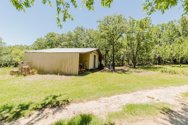 239 County Road 3586, Paradise, TX 76073 - view of grassy yard with an outbuilding and an outdoor structure