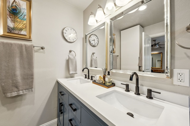 605 Cliffside Dr, Richardson, TX 75080 - bathroom featuring double vanity and ceiling fan