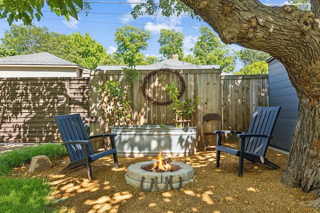 605 Cliffside Dr, Richardson, TX 75080 - view of patio / terrace with a fire pit