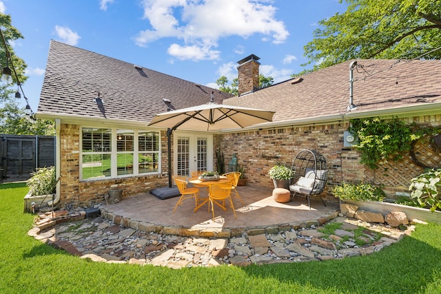 605 Cliffside Dr, Richardson, TX 75080 - rear view of property featuring a shingled roof, a chimney, brick siding, a patio area, and french doors