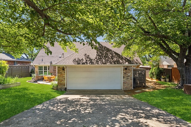 605 Cliffside Dr, Richardson, TX 75080 - view of front of home with driveway, brick siding, an attached garage, and a shingled roof