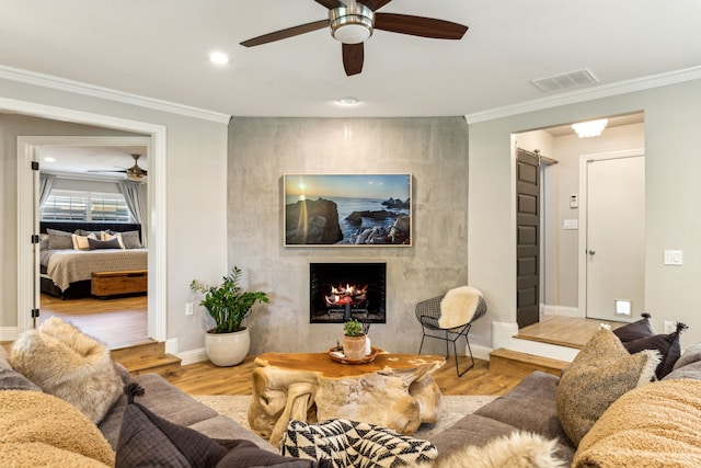 605 Cliffside Dr, Richardson, TX 75080 - living room with ceiling fan, a high end fireplace, ornamental molding, baseboards, and wood finished floors