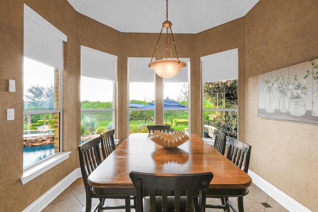 11667 Bent Creek Trl, Frisco, TX 75033 - dining space featuring baseboards and light tile patterned floors