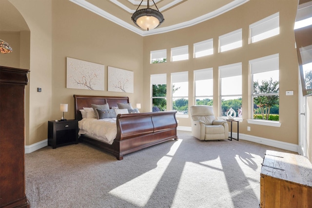 11667 Bent Creek Trl, Frisco, TX 75033 - carpeted bedroom featuring crown molding, a high ceiling, and arched walkways