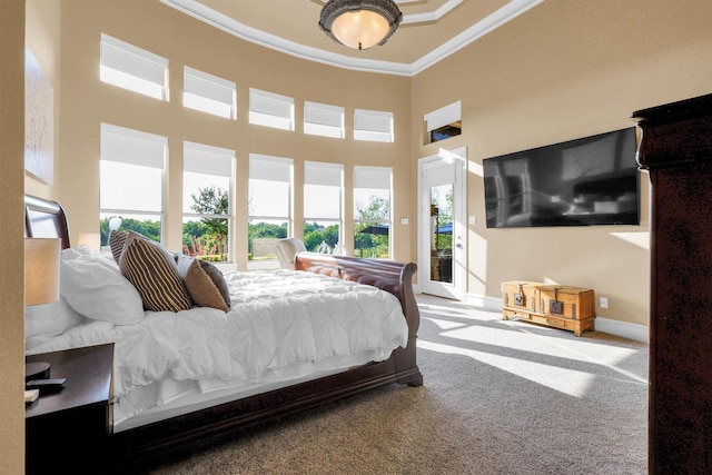 11667 Bent Creek Trl, Frisco, TX 75033 - bedroom with crown molding, multiple windows, carpet floors, access to outside, and a high ceiling
