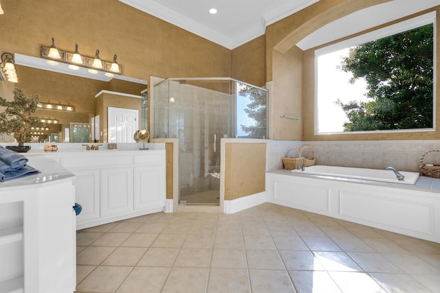 11667 Bent Creek Trl, Frisco, TX 75033 - bathroom featuring a garden tub, a stall shower, vanity, tile patterned flooring, and crown molding