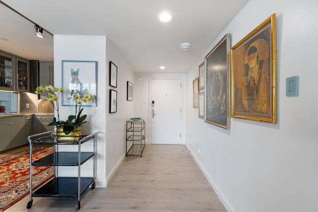 3310 Fairmount St Unit 16B, Dallas, TX 75201 - hall with light wood-type flooring, recessed lighting, and baseboards