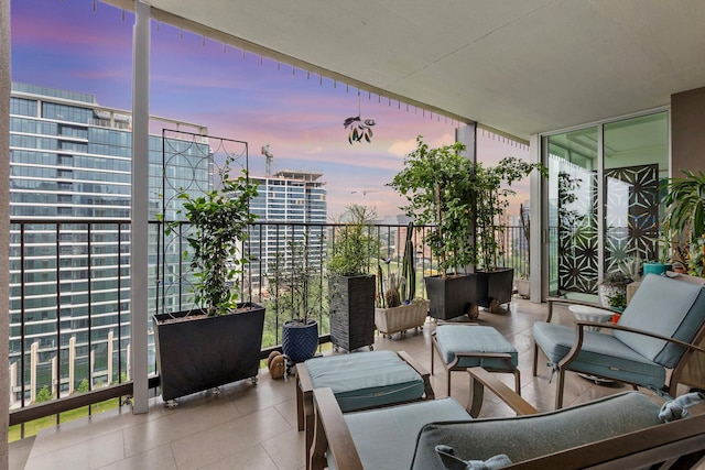 3310 Fairmount St Unit 16B, Dallas, TX 75201 - balcony at dusk with an outdoor hangout area