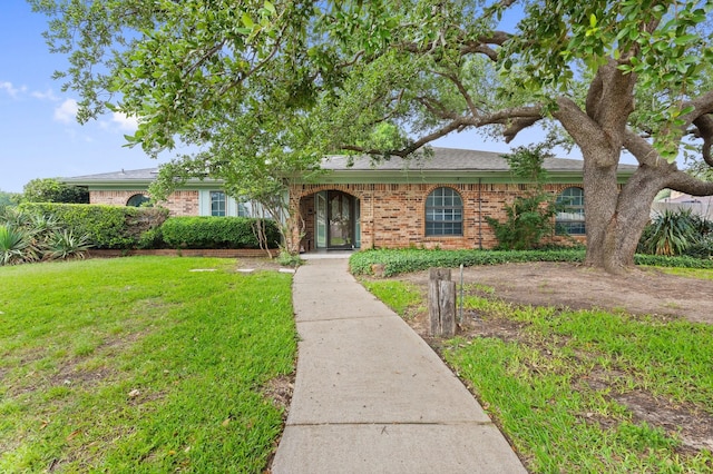 1720 Norwood Dr, Hurst, TX 76054 - ranch-style home with a front lawn and brick siding