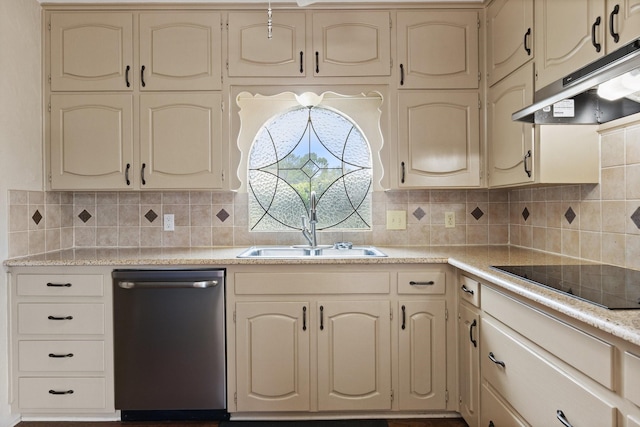 1720 Norwood Dr, Hurst, TX 76054 - kitchen with stainless steel dishwasher, black electric stovetop, under cabinet range hood, cream cabinetry, and light countertops