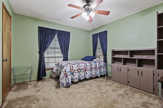 1720 Norwood Dr, Hurst, TX 76054 - carpeted bedroom featuring a textured ceiling and ceiling fan