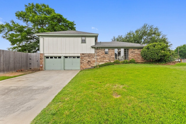 1720 Norwood Dr, Hurst, TX 76054 - view of front of home with driveway, brick siding, and an attached garage