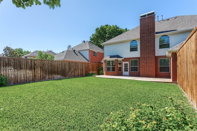 4109 Barnsley Dr, Plano, TX 75093 - rear view of property with brick siding, a chimney, a patio area, and roof with shingles