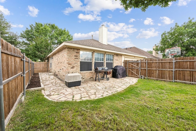 1629 Big Bend Dr, Lewisville, TX 75077 - back of property featuring brick siding, a patio, and a chimney