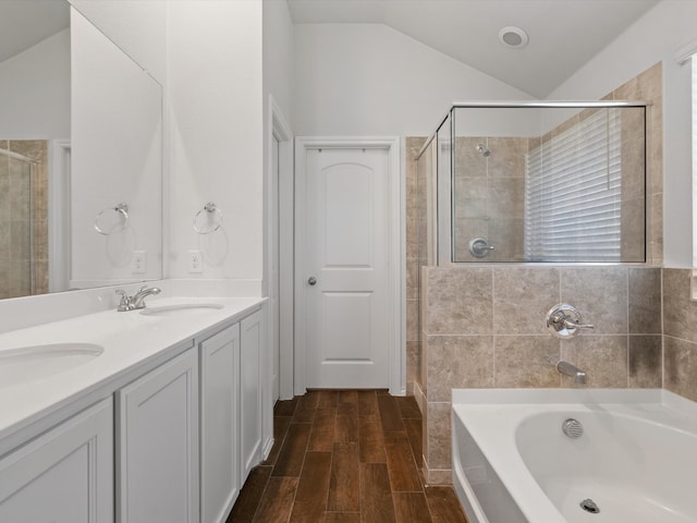 4204 Cordata Dr, Melissa, TX 75454 - full bathroom featuring a bath, a shower stall, double vanity, vaulted ceiling, and wood finished floors