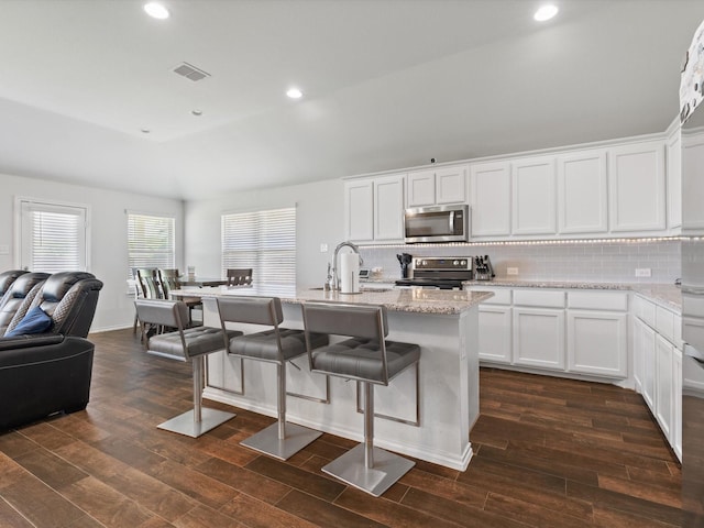 4204 Cordata Dr, Melissa, TX 75454 - kitchen featuring stainless steel appliances, a sink, open floor plan, backsplash, and recessed lighting