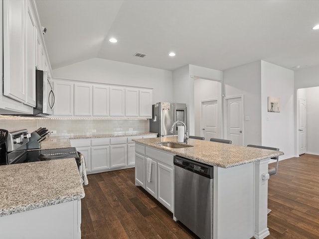 4204 Cordata Dr, Melissa, TX 75454 - kitchen featuring stainless steel appliances, a sink, backsplash, dark wood-style flooring, and vaulted ceiling