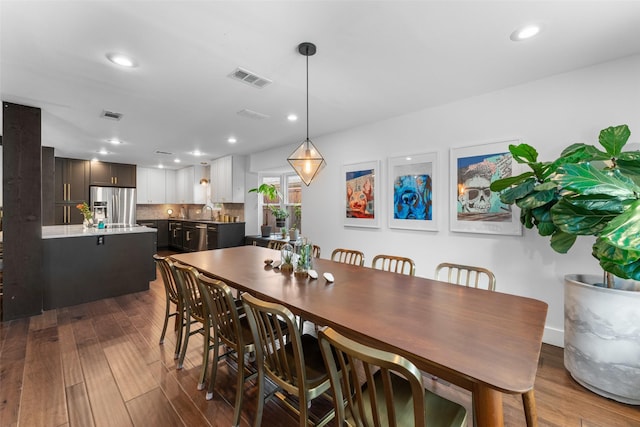 2909 N Britain Rd, Irving, TX 75062 - dining space with dark wood-style floors and recessed lighting