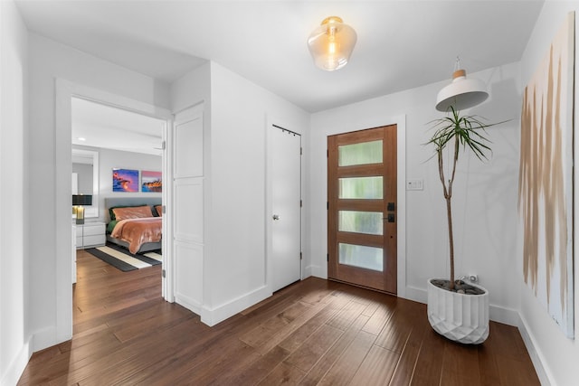 2909 N Britain Rd, Irving, TX 75062 - entrance foyer featuring dark wood finished floors and baseboards