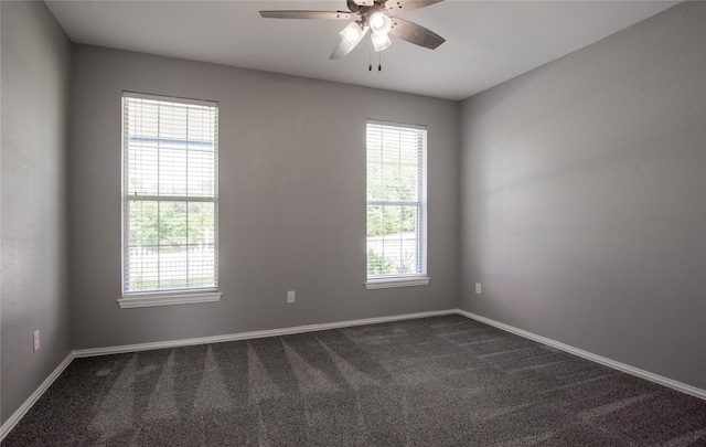 103 Saddle Club Rd, Weatherford, TX 76088 - spare room with dark colored carpet and plenty of natural light