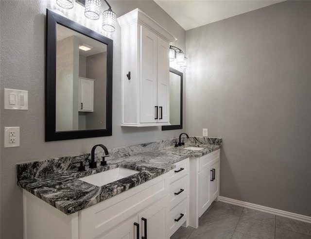 103 Saddle Club Rd, Weatherford, TX 76088 - bathroom featuring double vanity and baseboards